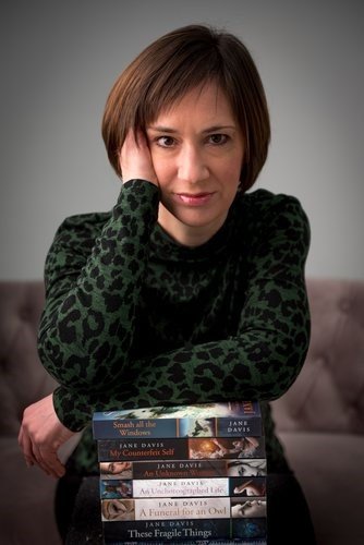 Author Jane Davis with her previous novels
